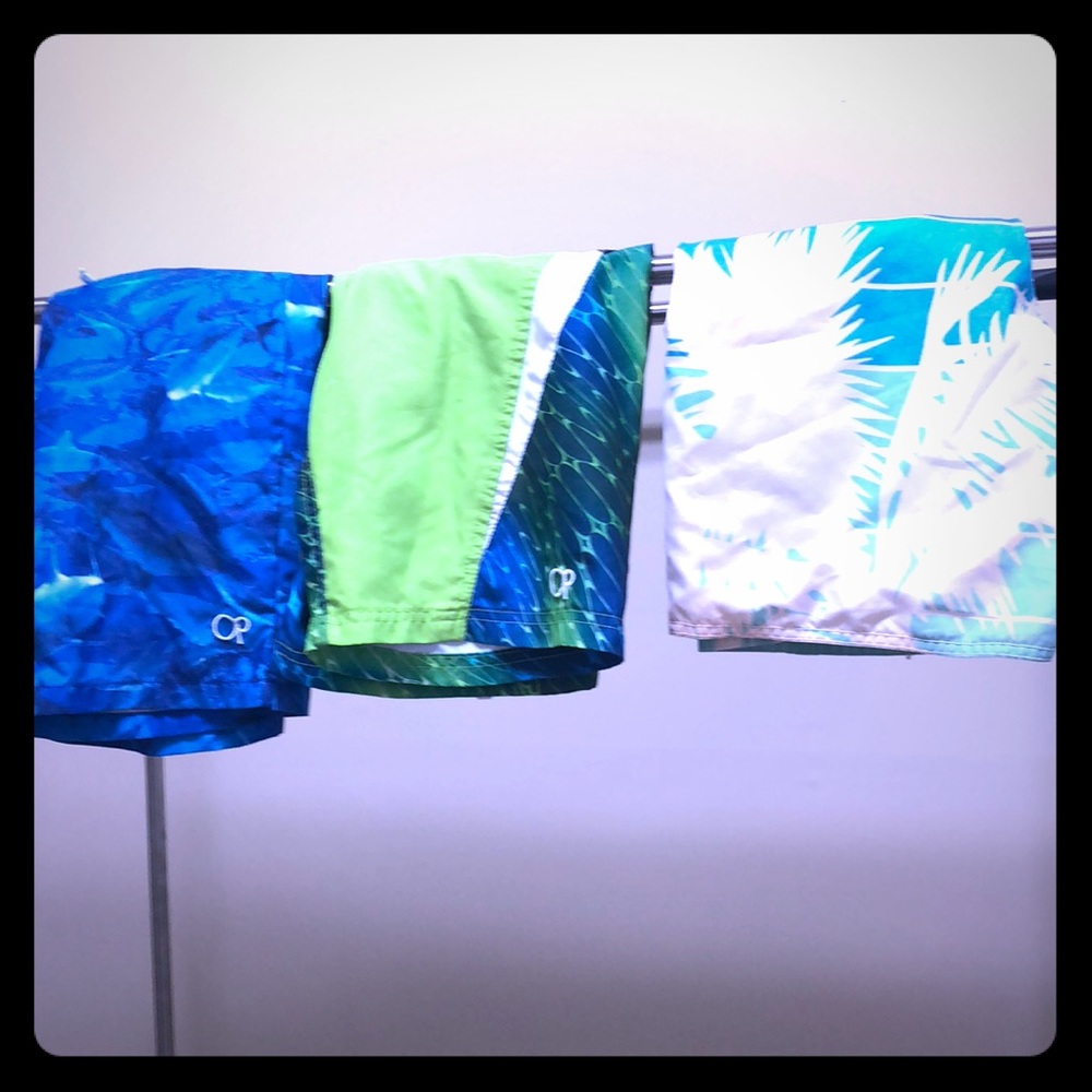 Lot of boys size 8 swimsuits and rash guards